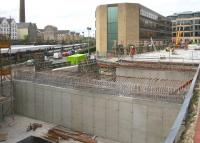 View west from Haymarket on 29 April 2010, showing construction work on the deck over the north side of the car park that will carry part of the tram interchange. Off to the right is  Haymarket Terrace while over on the left are the station platforms, where the East Coast 0952 Aberdeen - Kings Cross HST has just arrived. [See image 28745]<br>
<br><br>[John Furnevel 29/04/2010]