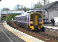 158707 carrying the nameplate <I>Far North Line 125th anniversary</I> on a Perth to Edinburgh service arriving at Inverkeithing on 30 April 2010.<br>
<br><br>[Brian Forbes 30/04/2010]