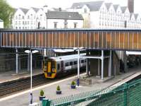 A mid-morning Edinburgh Waverley - Dunblane service makes its first scheduled stop as it draws to a halt at Haymarket's platform 4 on 29 April 2010.  <br><br>[John Furnevel 29/04/2010]