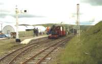Hunslet NG no 823 'Irish Mail' waiting with the next train at Leadhills station on the Leadhills and Wanlockhead Railway in July 1993. The locomotive was visiting from the West Lancashire Light Railway. <br>
<br><br>[John McIntyre 11/07/1993]