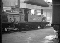 J72 0-6-0T no 68736 photographed inside one of the roundhouses at Gateshead in the early 1960s.<br><br>[K A Gray //]