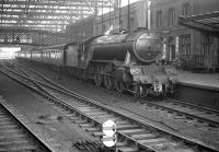 Gresley V2 2-6-2 no 60816 about to to take the 0825 Crewe - Perth train north out of Carlisle on 28 December 1963.<br><br>[Robin Barbour Collection (Courtesy Bruce McCartney) 28/12/1963]