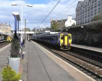 A 4-car 156 with a stopping service for Glasgow Central calls at Haymarket on 3 May 2010<br><br>[David Panton 03/05/2010]