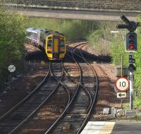 An outer circle train takes the Dunfermline line at Inverkeithing Central Junction on 30 April shortly after leaving Inverkeithing station.<br>
<br><br>[Brian Forbes 30/04/2010]
