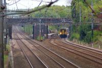 A Liverpool to Blackpool North service photographed through Balshaw Lane road bridge as it calls at Euxton Balshaw Lane station on 8 May 2010. <br>
<br><br>[John McIntyre 08/05/2010]