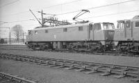 BR AC Electric Class AL5 no E3059 stands alongside class AL1 no E3009 on Allerton shed, Liverpool, in April 1962. View is north west from the end of the locomotive depot sidings. <br><br>[K A Gray 15/04/1962]