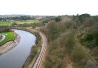 View west from Larpool viaduct on 23 March 2010 showing the Whitby and Pickering Railway running alongside the Esk towards Grosmont. The pathway on the right is the trackbed of the former link via Prospect Hill Junction that climbed steeply from the W&P before swinging north to join the Scarborough - Whitby - Middlesbrough coastal route near Whitby West Cliff station at the northern end of the viaduct. [See image 23574]<br><br>[John Furnevel 23/03/2010]