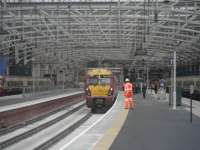 A 334 sits in the new platforms at Glasgow Central.<br><br>[John Yellowlees 12/05/2010]