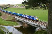 <I>And there's more...</I> Stobart Rail liveried 92017 runs north over the Clyde viaduct at Crawford on 11 May 2010 with a long, long train of Tesco containers.<br><br>[John Furnevel 11/05/2010]