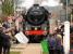 Celebrating the reopening of Sheringham level crossing, Norfolk, as Britannia Pacific no 70013 <I>Oliver Cromwell</I> arrives with <I>The Broadsman</I> RTC special from Liverpool Street. The banner reads <I>North Norfolk Railway - Reconnected to national network after 46 years - March 11th 2010</I>.<br><br>[Ian Dinmore 11/03/2010]