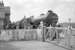 62005 stands at Catterick Bridge on the Richmond branch with the SLS <i>Three Dales Railtour</I> on 20 May 1967. View is west from the level crossing over the A6136 and the train is on its way back from the branch terminus at Richmond [see image 25318] heading for Westgate-in-Weardale.<br><br>[Robin Barbour Collection (Courtesy Bruce McCartney) 20/05/1967]