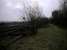 The disused signalbox at Penistone, seen in 2002, viewed from the trackbed of the former Woodhead Route. Route to Huddersfield to the left and straight on to Barnsley (and formerly Sheffield).<br><br>[Ewan Crawford 12/03/2002]