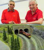 Roy Garrett and Tom Rout, from Kyle Model Railway Club, with one of<br>
their new layouts at Irvine station. [See news item]<br><br>[First ScotRail 16/04/2012]