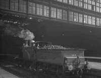 CR123 stands below the great screen of Princes Street train shed on 19 April 1965 after bringing in <I>Scottish Rambler no 4</I> from Glasgow Central.<br><br>[K A Gray 19/04/1965]