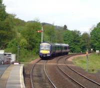The 08.33 Edinburgh to Inverness departs Pitlochry at 10.24 (5 minutes late) on 20 May past the starter at danger. Signal technicians were working at the open box and the signalman had authorised the movement.<br><br>[Colin Miller 20/05/2010]