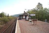 Looking south towards County March Summit and Tyndrum along the island platform and past the surviving station buildings at Bridge of Orchy.<br><br>[Mark Bartlett 18/05/2010]