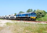 Foster Yeoman 59002 with an eastbound stone train passing Crofton on 4 June.<br>
<br><br>[Peter Todd 04/06/2010]