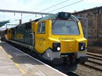 Freightliner 70 002 waits at Carlisle platform 1 on 3 June with northbound coal empties.<br><br>[Colin Miller 03/06/2010]