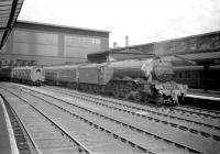 Holbeck A3 Pacific no 60092 <I>Fairway</I> stands at Carlisle on 9 July 1960, carrying the headboard of <I>The Thames-Clyde Express</I>, bound for St Pancras via the Settle & Carlisle and Midland routes.<br><br>[Robin Barbour Collection (Courtesy Bruce McCartney) 09/07/1960]