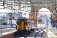 A service from Paisley Canal runs through the arch and into the new platform 12 at Glasgow Central on 3 June 2010.<br><br>[Colin Miller 3/06/2010]