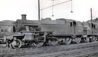 40185 and 40244 stand on Bangor shed (6H) in the late 50s/early 60s. The shed closed in June 1965.<br><br>[K A Gray //]