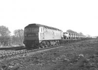 Class 47 no 1737 on the 09.55 Bathgate - Kings Norton heading west along the Sub near Duddingston Junction on 4 February 1970.<br>
<br><br>[Bill Jamieson 04/02/1970]