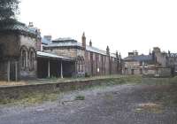 View east at a run down Saltburn in the late 1970s showing the north side of the former station. In the far right background stands the Zetland Hotel, built by the Stockton & Darlington Railway in 1863 and once served by its own private platform. [See image 29466] <br><br>[Ian Dinmore //]