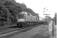 A northbound train speeds past Eamont Bridge Junction on the West Coast Main Line in September 1967 hauled by an EE Type 4 locomotive . <br><br>[Colin Miller 25/09/1967]