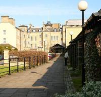 The old private platform of the Zetland Hotel, Saltburn, now incorporated into the landscaped and redeveloped area that once formed part of the station. View east from the end of the main public platform [see image 17867] in 2008 showing the canopy over the rear entrance to the hotel once used by guests arriving or departing by train.<br>
<br><br>[John Furnevel 03/04/2008]