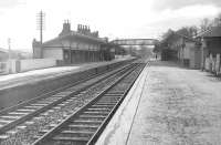 Sixties view along the down platform at Melrose. Note the cast iron 'facilities' on the right, which were subsequently obtained by the Severn Valley Railway where they are in use at Bewdley station. [See image 13842]<br><br>[Robin Barbour Collection (Courtesy Bruce McCartney) //]