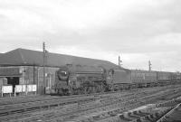 Jubilee 4-6-0 no 45736 <I>Phoenix</I> passing Crown Street goods depot on the southern approach to Carlisle in the 1960s with the 3.40pm ex-Bradford. No 45736 was one of the pair of specially rebuilt versions of the class, along with 45735 <I>Comet</I> [see image 23555]. This particular example was withdrawn from Kingmoor in September 1964 and cut up at Hughes Bolckows, North Blyth, the following January. <br><br>[K A Gray 11/07/1964]