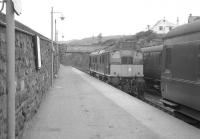 A Sulzer Type 2 coming onto the Inverness train at Kyle of Lochalsh in July 1963<br><br>[Colin Miller /07/1963]