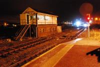 The Workington - Maryport shuttle pulls into Maryport from the south in February 2010, having waited for a service from Carlisle to clear the single platform.<br><br>[Ewan Crawford /02/2010]