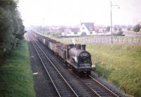 McIntosh 3F 0-6-0 no 57580 with empty mineral wagons heading south at Troon in the summer of 1959.<br><br>[A Snapper (Courtesy Bruce McCartney) 21/08/1959]