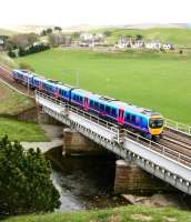 The 12.54 Glasgow Central - Manchester Airport TransPennine Express service crosses the Clyde at Crawford on 11 May 2010. <br><br>[John Furnevel 11/05/2010]