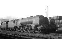 Coronation Pacific no 46257 <I>City of Salford</I> on Kingmoor shed in the early 1960s with Ayr Black 5 no 45194 standing alongside.<br><br>[K A Gray //]