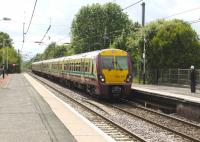 A Glasgow - bound EMU arrives at Glengarnock on 25 July 2010 [see image 25334 for the view from the same spot forty seven years earlier].<br><br>[Colin Miller 25/07/2010]