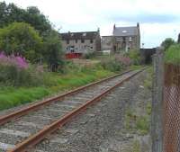 The Rosyth Dockyard branch, looking south along the single line route on 24 July 2010, with Inverkeithing South Junction behind the camera. A train had just passed by here.In fact it was a fortnight previously [see image 29753] but in terms of this branch that's a twinkling.<br><br>[David Panton 24/07/2010]