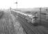 Class 26 no D5311takes the line towards Millerhill at Niddrie West Junction in February 1970 with the 11.40 cement empties from Irvine to Oxwellmains.<br><br>[Bill Jamieson 04/02/1970]