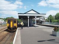 <I>Par excellence!</I> Par is a junction station with its original buildings and where main line trains still connect with branch line services. There are freight trains on the main line and branch too and all movements in the station are controlled by lower quadrant semaphores. 150248 waits to form a service to Newquay in this view towards Lostwithiel on 15 June 2010.<br><br>[Mark Bartlett 15/06/2010]