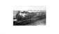 A L&YR railmotor stands in Holcombe Brook station with the engine facing the buffers and railway staff posing for the camera. An undated photo that may have been taken around 1905, when the railmotors were introduced to compete with a new tram service and additional halts opened on the branch. It was certainly taken before 1913 when the branch was electrified. [See image 22369] for a view of the same spot some 47 years later with another L&YR loco on the last weekend of service. Photo courtesy of Bury Historical Society.<br><br>[W A Camwell Collection (Courtesy Mark Bartlett) //1905]