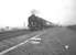 With the signal gantry at Heaton South Junction visible in the right background through the smoke and haze drifting off Heaton shed, Peppercorn A2 Pacific no 60539 <I>Bronzino</I> takes a northbound train away from Newcastle on the ECML aound 1960. A Heaton resident for much of its life the locomotive ended its days at Tweedmouth shed, from where it was eventually withdrawn by BR in November 1962.<br><br>[K A Gray //1960]