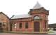 Entrance to the booking office at the former Clydebank Riverside station on a wet 8 June 2010. The station was closed in 1964 since when the building has been restored and converted to residential accommodation.<br><br>[John Furnevel 08/06/2010]