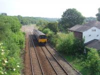 When Lostock Jcn was originally open the station building sat in the 'V' of the junction with four platforms. These were swept away after closure and on reopening only the Chorley line platforms were reinstated. 150146 climbs away from the junction on the L&YR built link to Wigan via Westhoughton passing the site of the removed platforms.<br><br>[Mark Bartlett 26/06/2010]