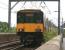 318263 crosses the River Ayr on 3 July 2010 shortly after leaving Ayr station at the start of its journey to Glasgow Central.<br><br>[John McIntyre 03/07/2010]