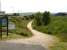 Start of the section of Moray cycle track heading east along the former trackbed towards Cullen, seen from the A942 on the south edge of Portknockie in June 2010.<br><br>[David Pesterfield 26/06/2010]