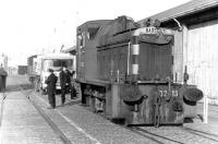 Parking problem in Leith Docks - Barclay DM shunter D2413 arrives from Leith Central depot with a 3-man crew in June 1970 to find the way blocked.<br><br>[John Furnevel 02/06/1970]