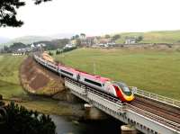 A southbound Virgin Pendolino glides over Crawford viaduct on a grey and damp afternoon in May 2004.<br><br>[John Furnevel 10/05/2004]