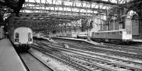 Platform scene at Glasgow Central in August 1981, with a DMU leaving for Stranraer Harbour.<br><br>[John Furnevel 18/08/1981]