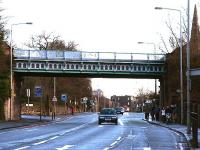 Looking east at the Caledonian Railway bridge across Roseburn Terrace on the Granton branch with Murrayfield station to the left, 2002.<br><br>[John Furnevel //2002]
